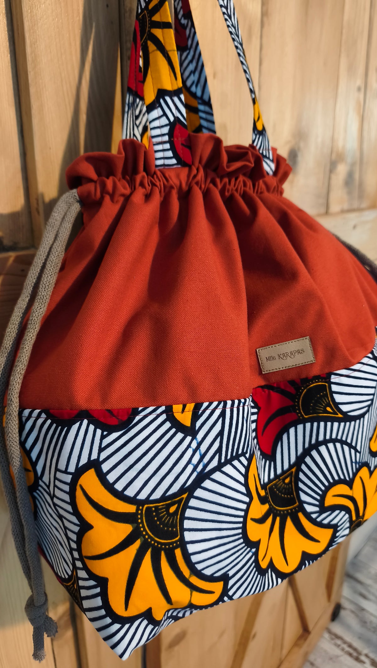 Maxi sac pochon en toile de coton terracotta et wax – Fait main – Mlle Karapas Mlle Karapas